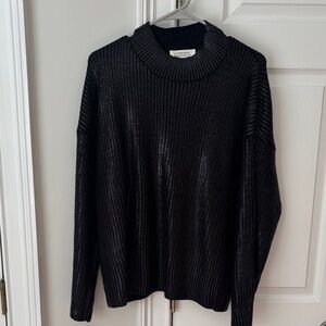 Black metallic sweater. 
Boutique brand